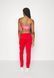 Спортивні штани Adidas Originals SST у великих розмірах жіночі Червоний (HD2105 red LPP (XL)
